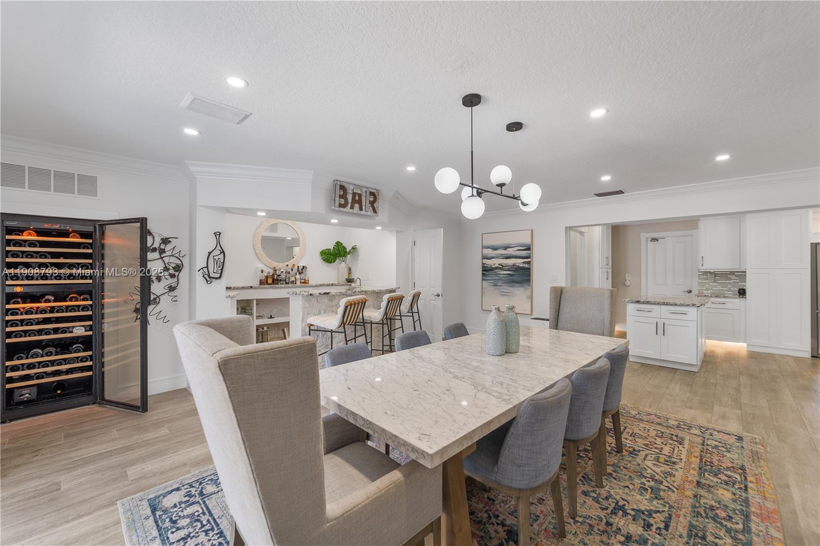 4011 Northeast 26th Avenue Lighthouse Point, FL 33064 - Photo 10 of 35 a view of a dining room with furniture