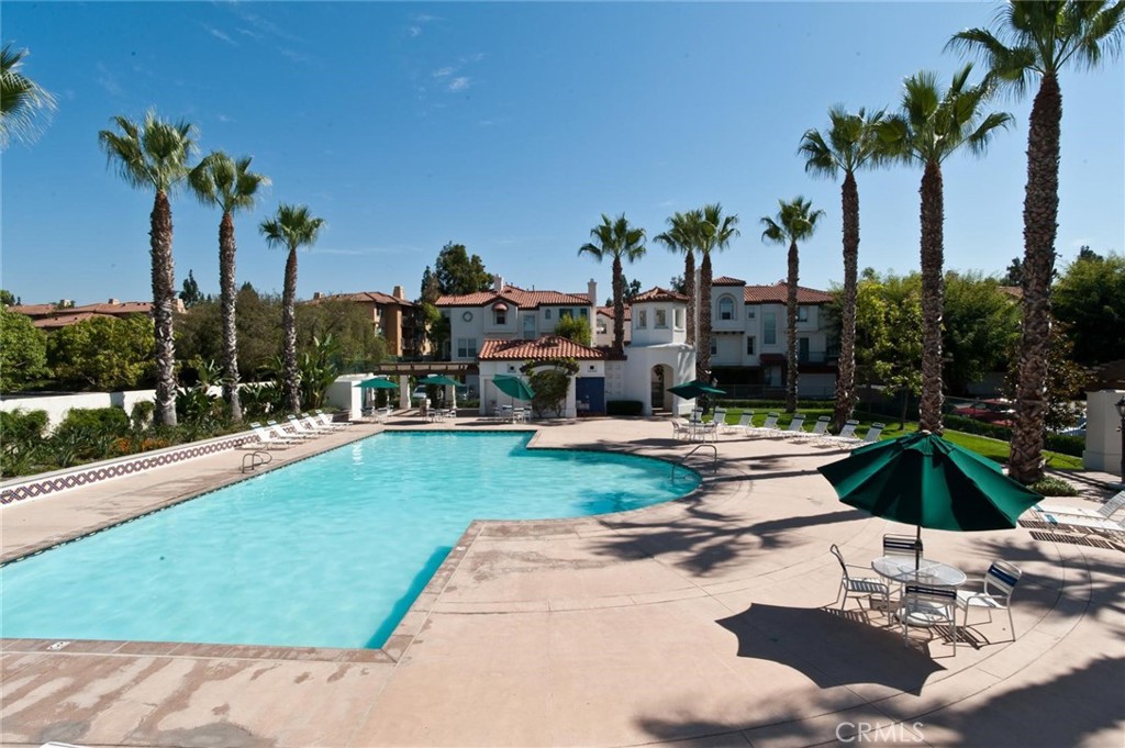 2830 Ballesteros Lane Tustin, CA 92782 - Photo 17 of 28 a view of a swimming pool and a patio