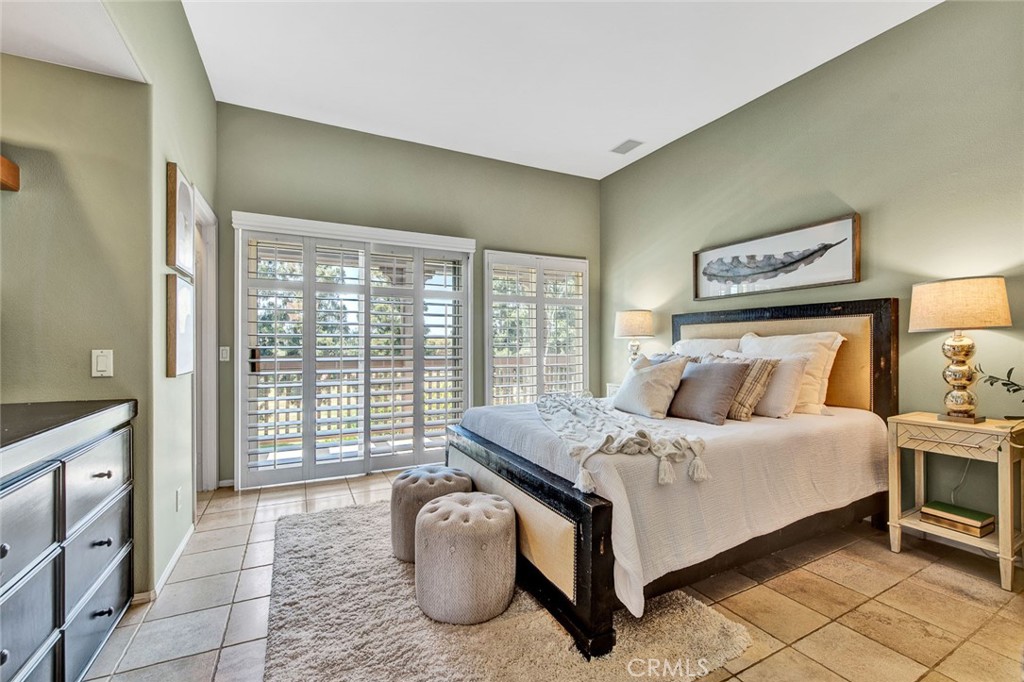 2830 Ballesteros Lane Tustin, CA 92782 - Photo 7 of 28 a bedroom with a bed and a night stand