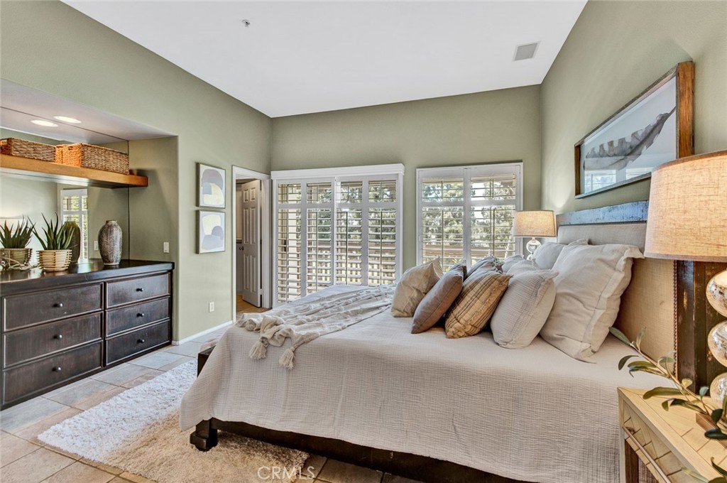 2830 Ballesteros Lane Tustin, CA 92782 - Photo 8 of 28 a bedroom with a bed and window