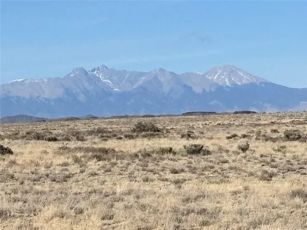a view of ocean and a mountain