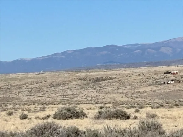 a view of ocean and mountain