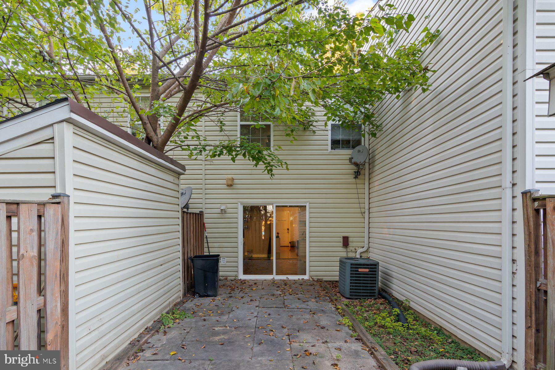 584 Cotswold Court Frederick, MD 21703 - Photo 20 of 21 a view of a house with a yard and garage