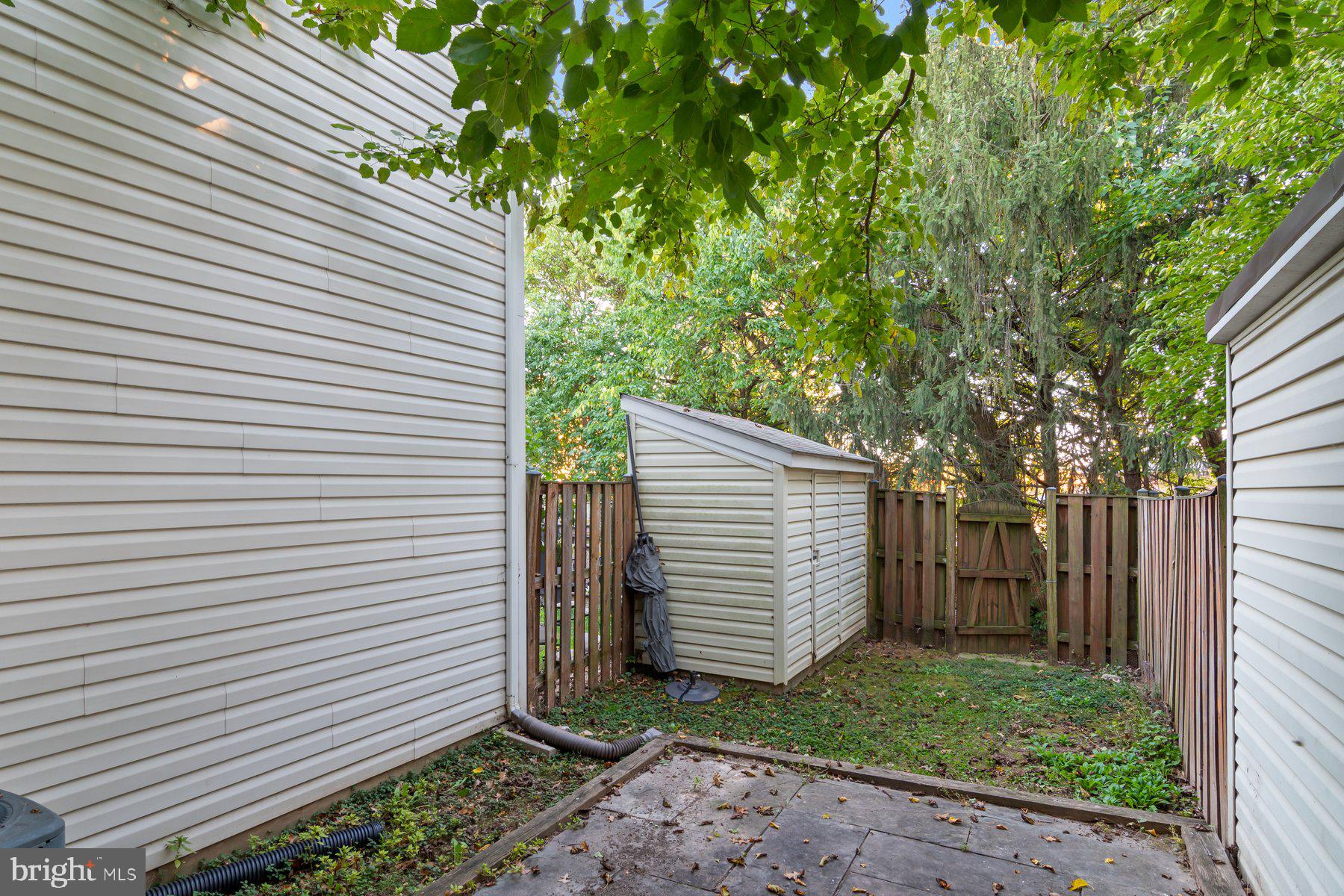 584 Cotswold Court Frederick, MD 21703 - Photo 21 of 21 a view of a small space in a backyard