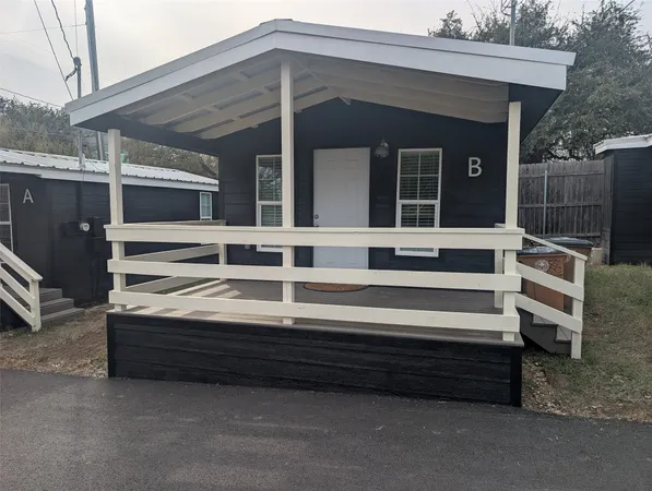a view of front door and house
