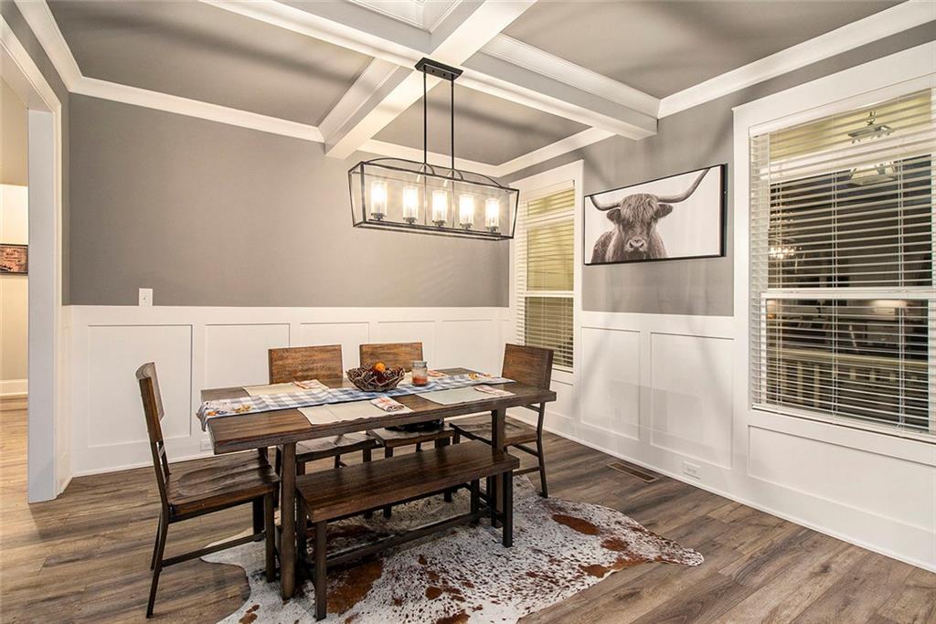 17 Wendover Drive Cartersville, GA 30120 - Photo 8 of 32 a view of a dining room with furniture and wooden floor