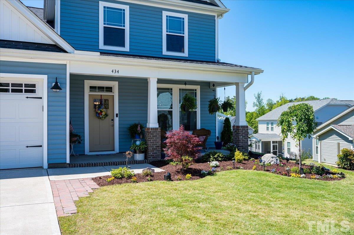 434 Streamliner Boulevard Clayton, NC 27520 - Photo 1 of 27 a view of a house with yard porch and furniture