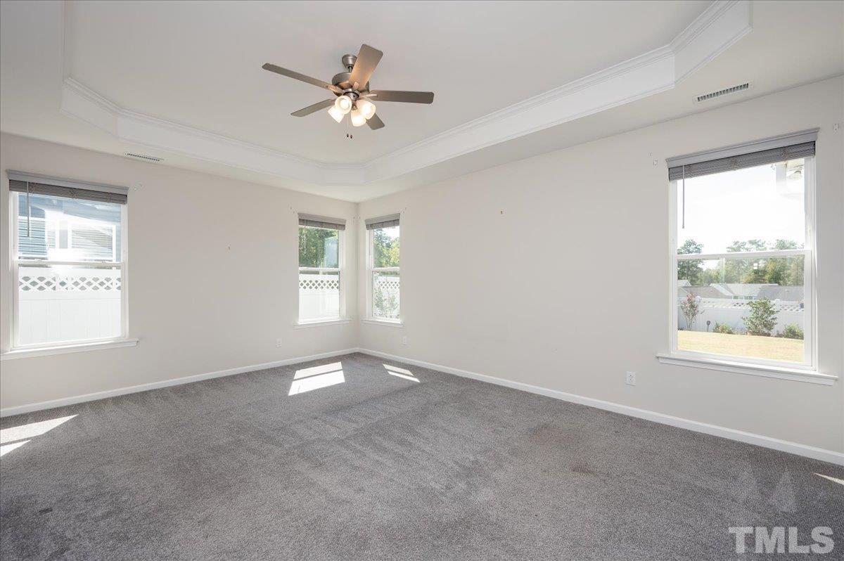 434 Streamliner Boulevard Clayton, NC 27520 - Photo 17 of 27 a view of an empty room with a window