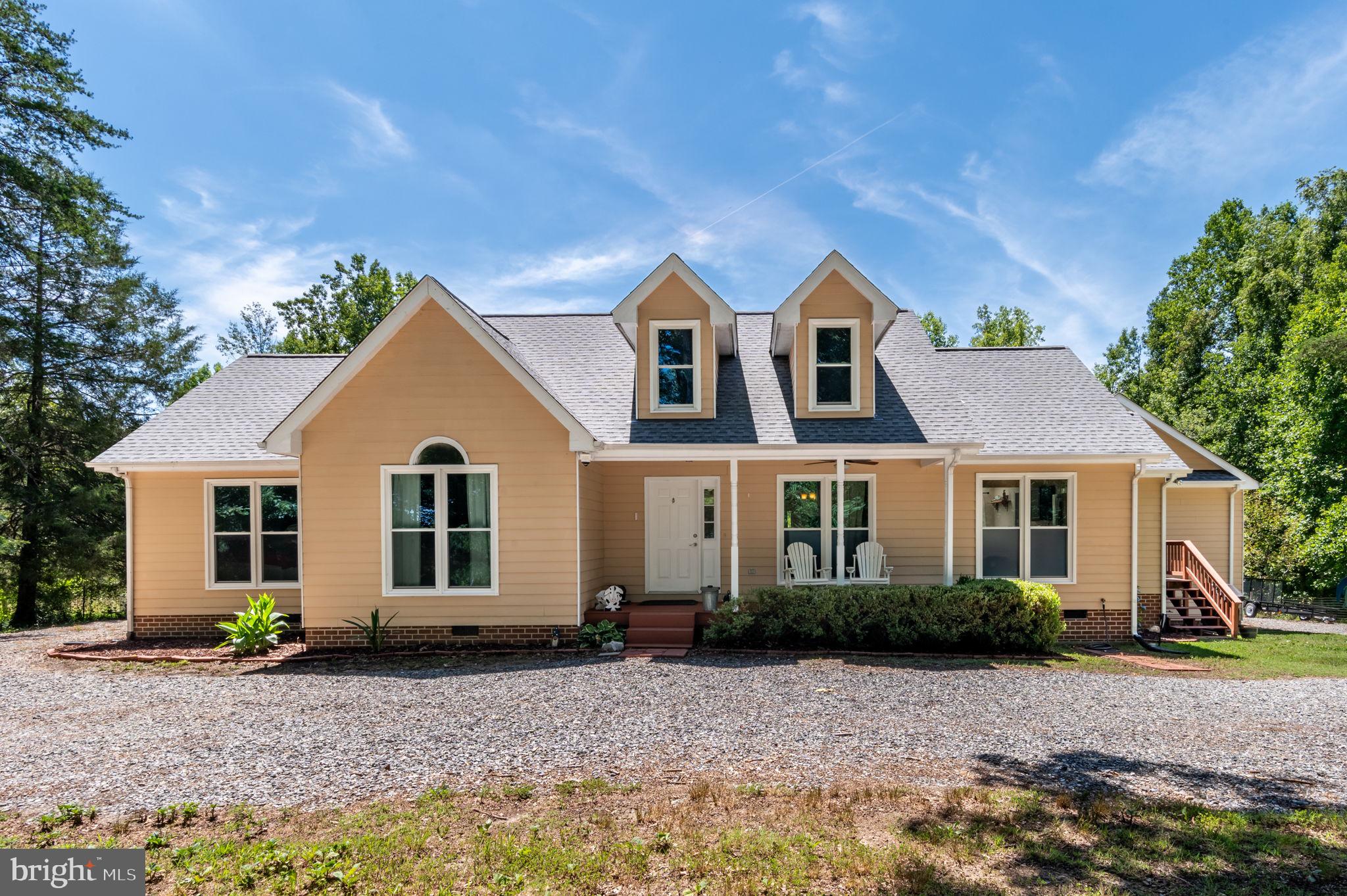 3485 Tabscott Road Columbia, VA 23038 - Photo 1 of 40 a front view of a house with a yard