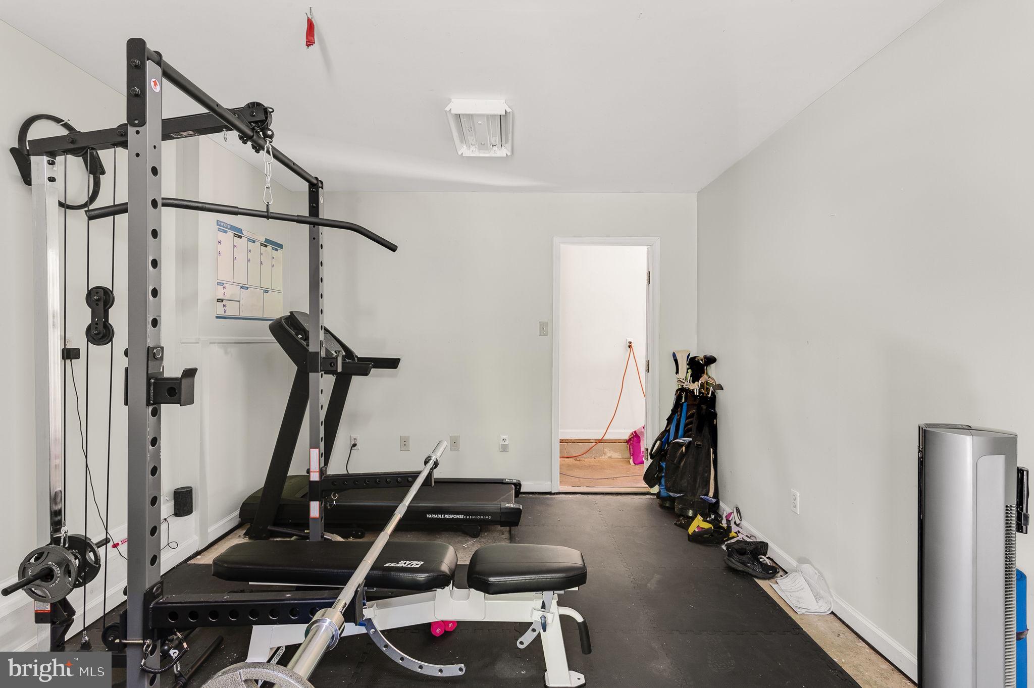 3485 Tabscott Road Columbia, VA 23038 - Photo 17 of 40 a view of a room with gym equipment