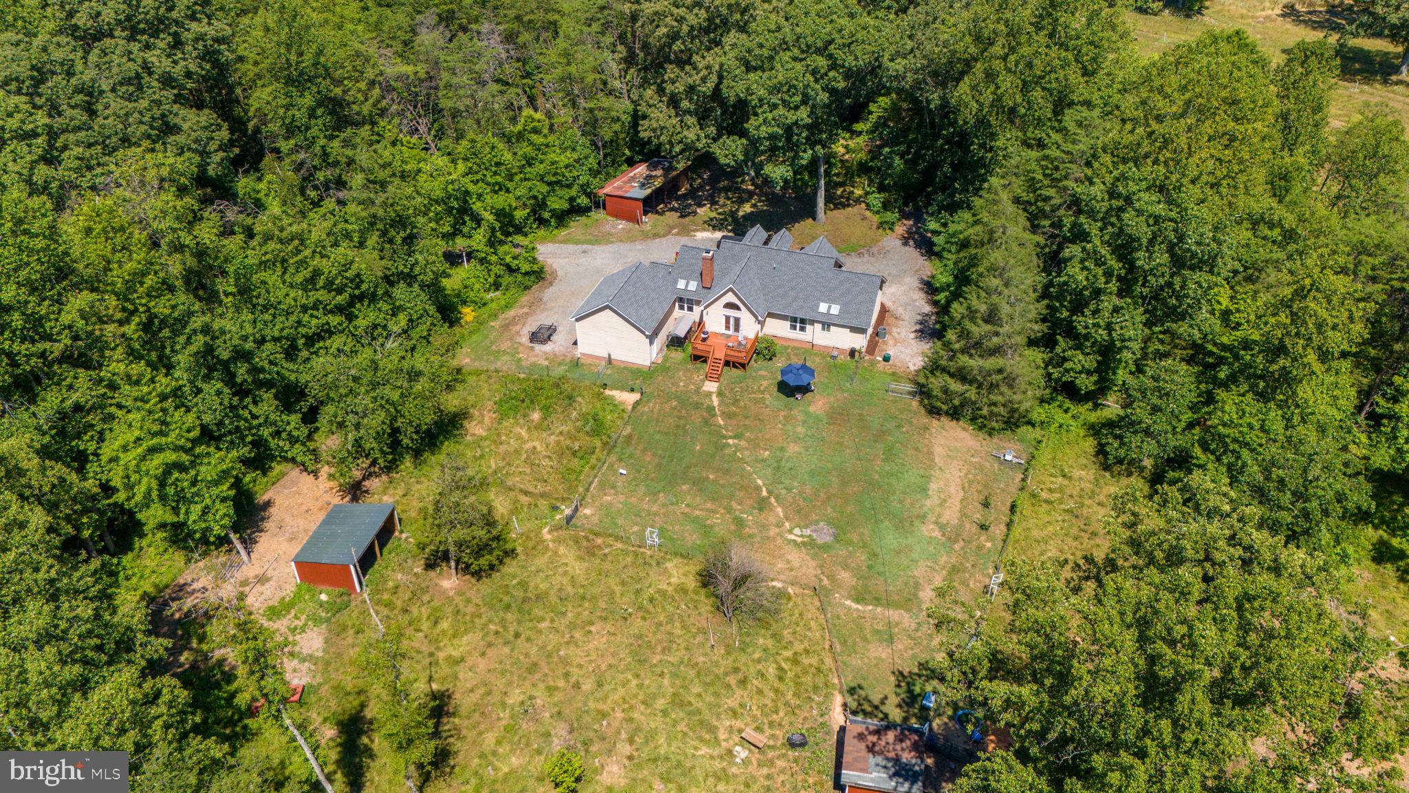 3485 Tabscott Road Columbia, VA 23038 - Photo 30 of 40 an aerial view of residential house with outdoor space and trees all around