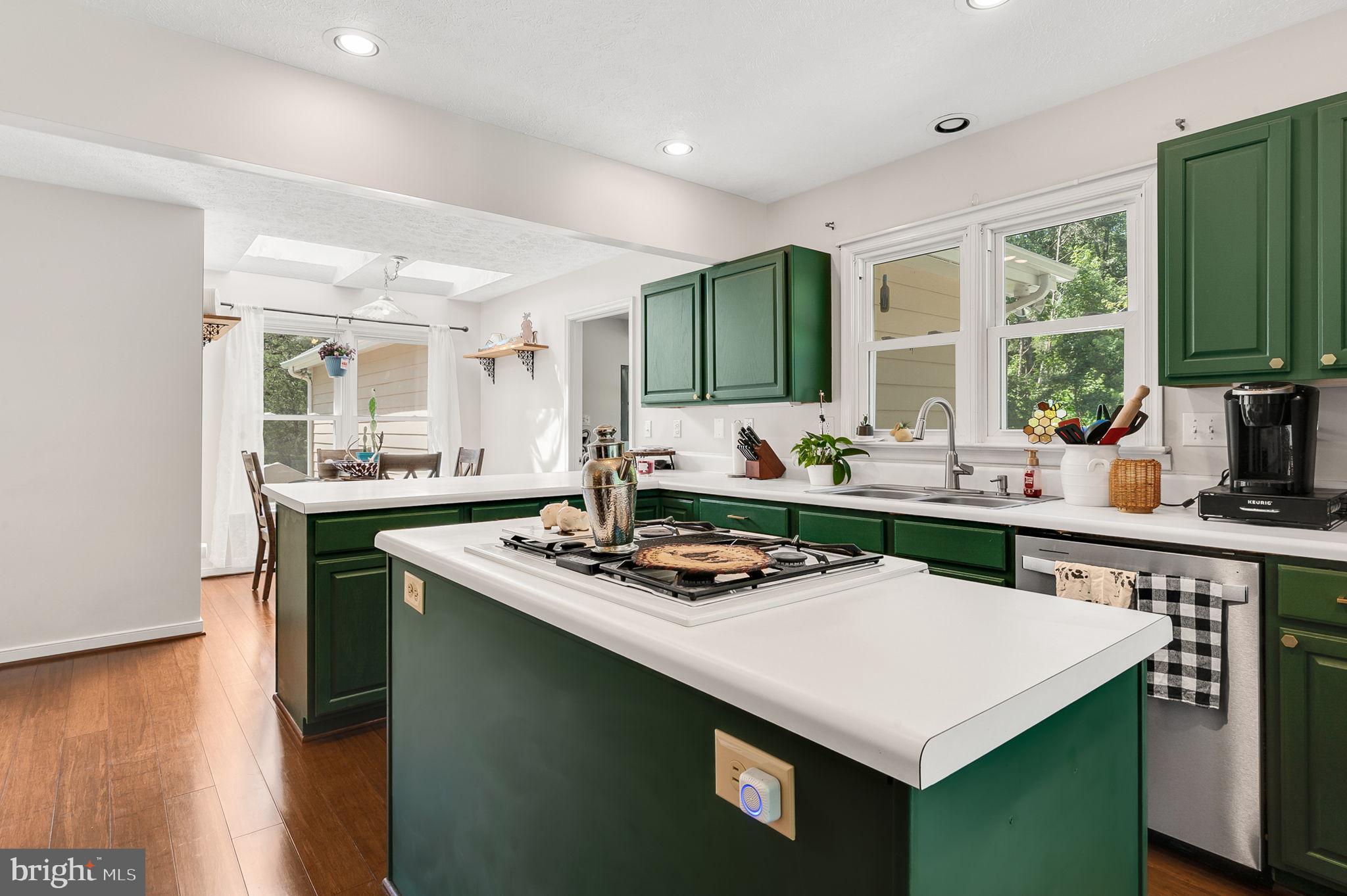 3485 Tabscott Road Columbia, VA 23038 - Photo 5 of 40 a kitchen with a stove a sink and a refrigerator