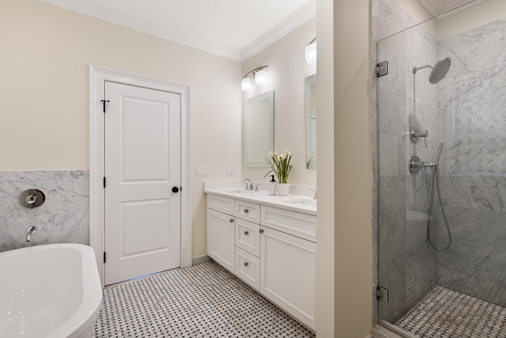 197 Rawson Road, Unit 1 Brookline, MA 02445 - Photo 11 of 27 a bathroom with a sink a toilet and shower