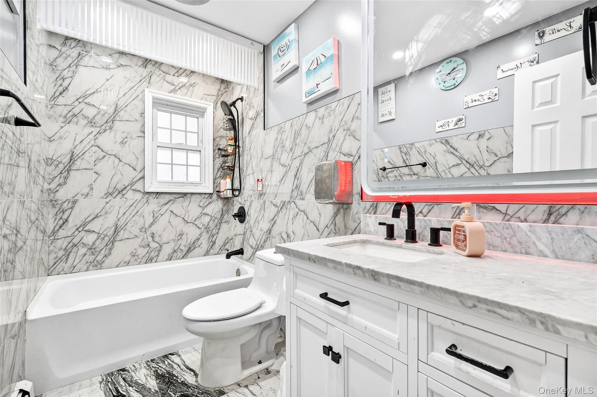 35 Maple Lane Monroe, NY 10950 - Photo 19 of 48 a bathroom with a granite countertop sink mirror vanity and toilet