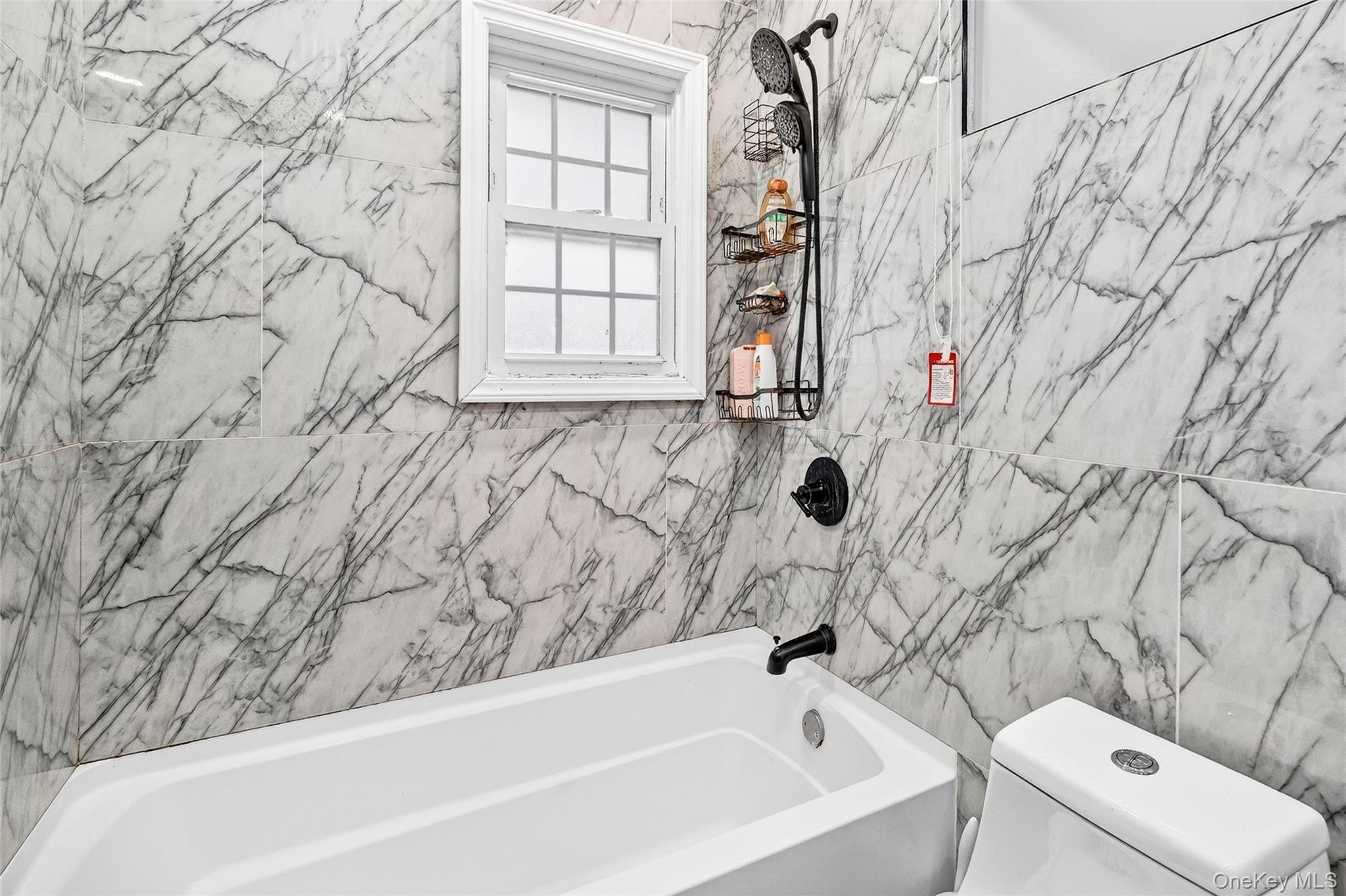 35 Maple Lane Monroe, NY 10950 - Photo 21 of 48 a bathroom with a bathtub and shower