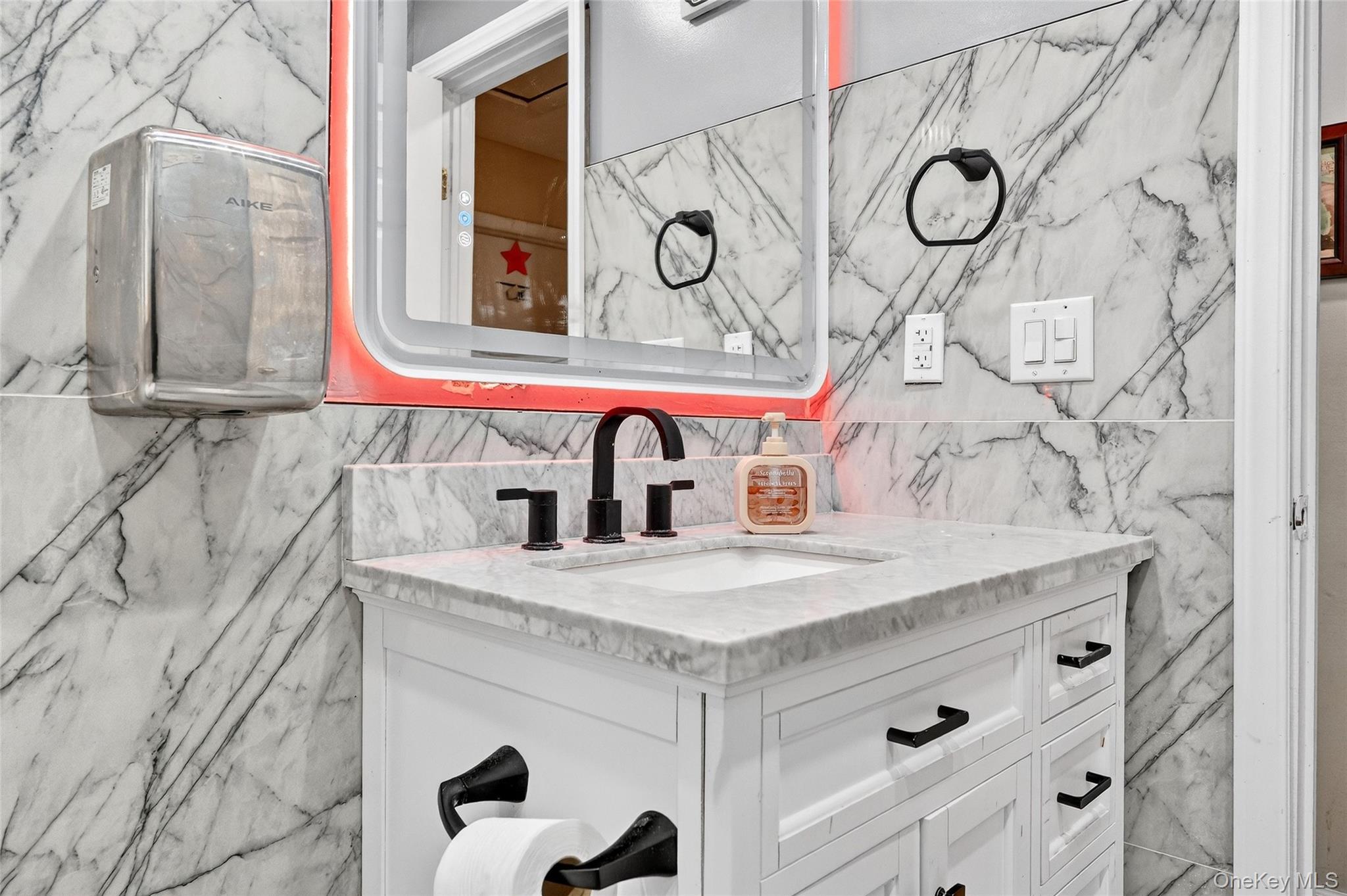 35 Maple Lane Monroe, NY 10950 - Photo 22 of 48 a bathroom with a sink and a mirror