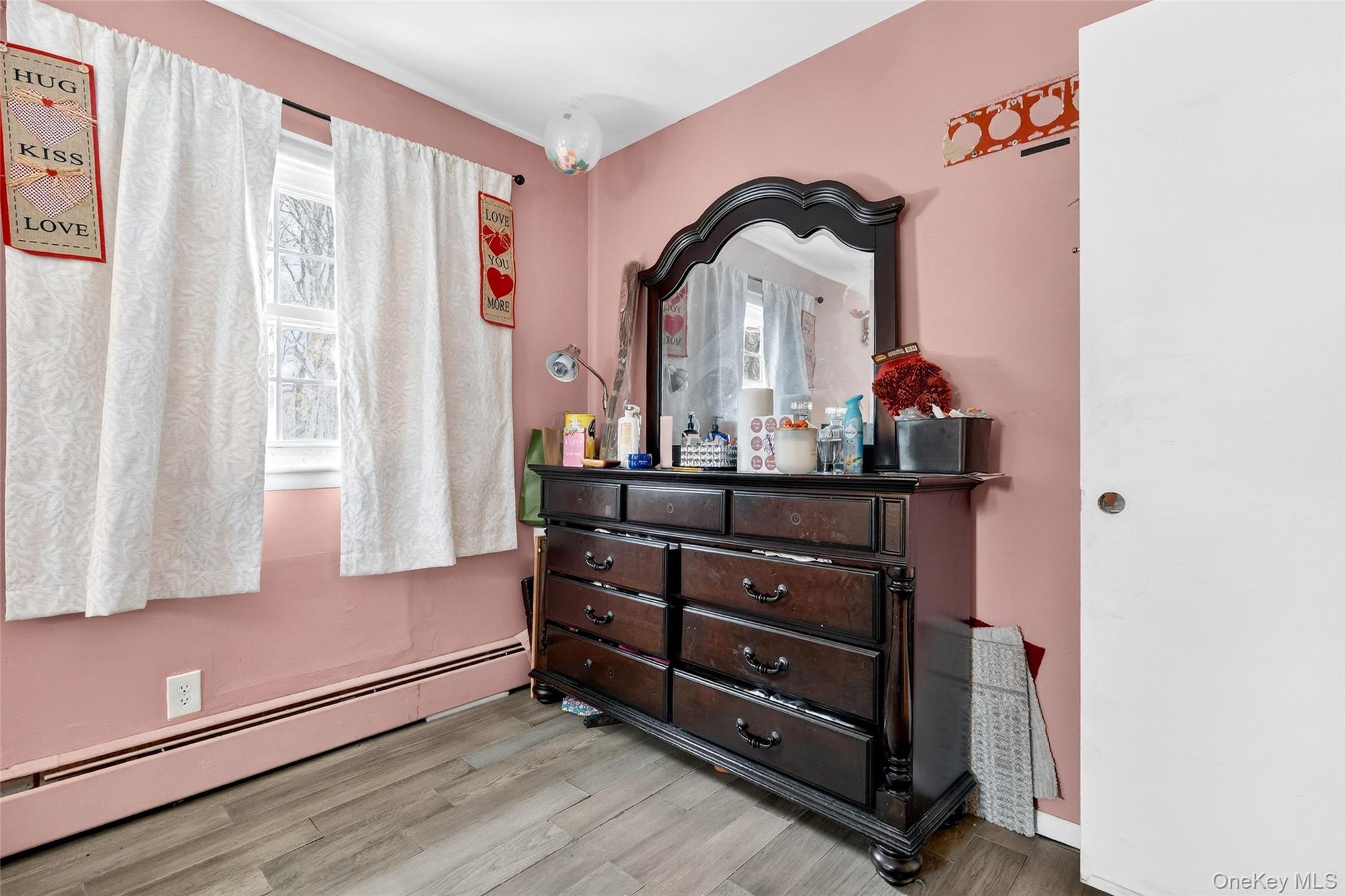 35 Maple Lane Monroe, NY 10950 - Photo 25 of 48 a room with a dresser and a window