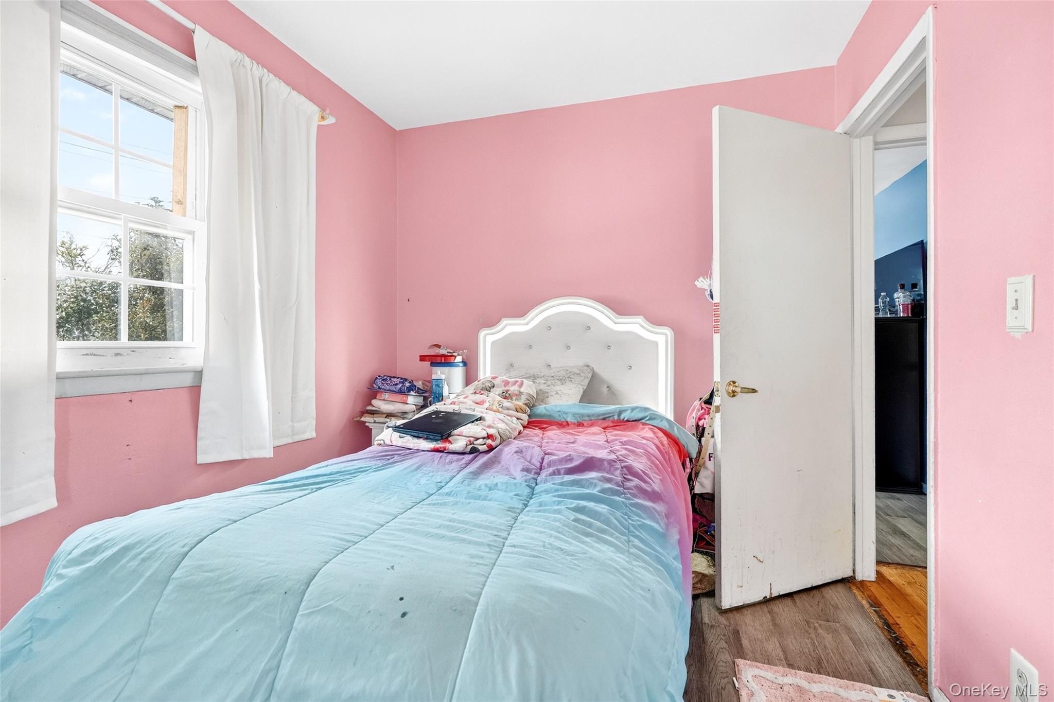 35 Maple Lane Monroe, NY 10950 - Photo 31 of 48 a bedroom with a bed and a window