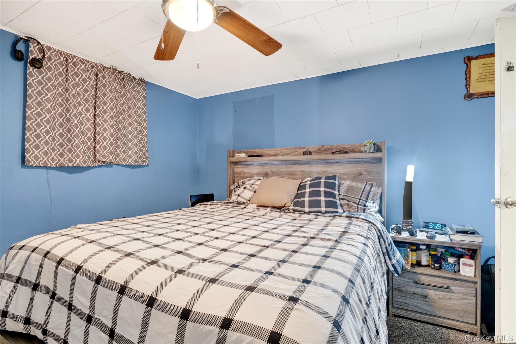 35 Maple Lane Monroe, NY 10950 - Photo 35 of 48 a bedroom with a bed and a window