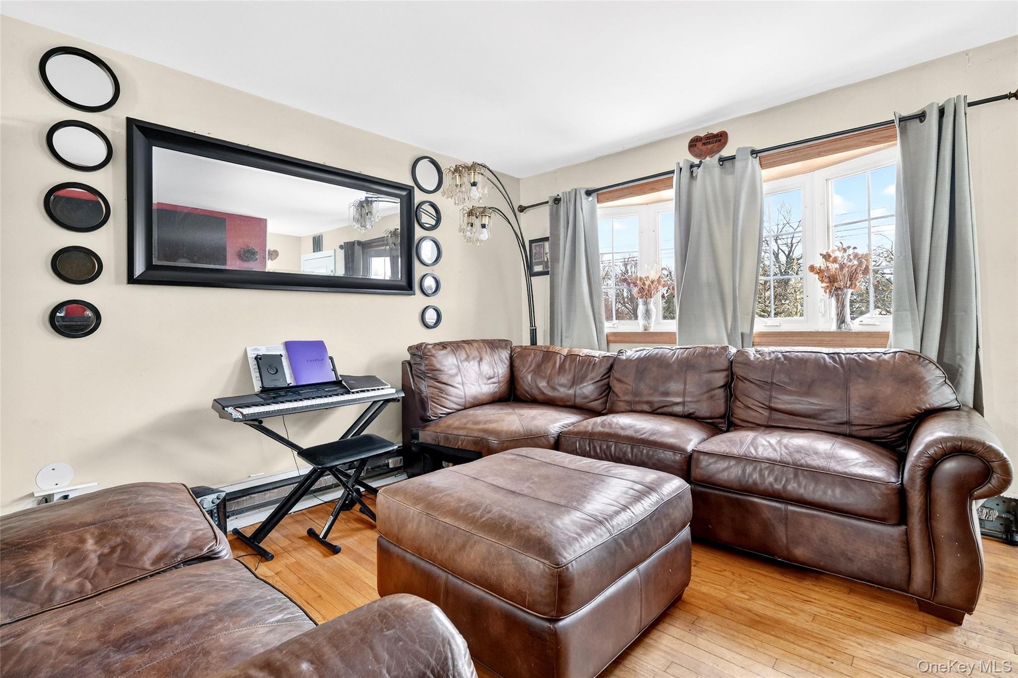35 Maple Lane Monroe, NY 10950 - Photo 8 of 48 a living room with furniture and a large window