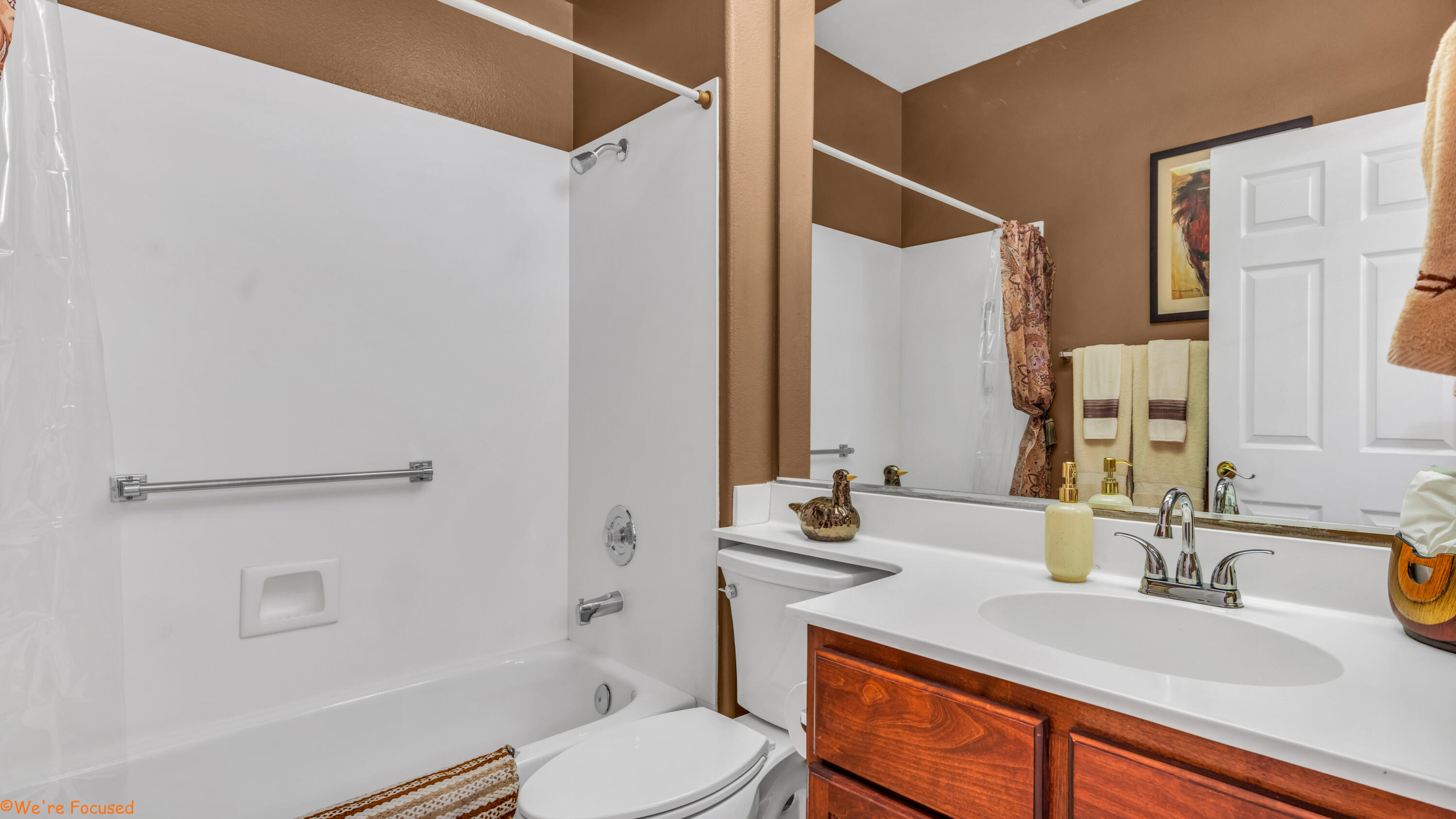 78326 Moongold Road Palm Desert, CA 92211 - Photo 23 of 33 a bathroom with a sink toilet vanity and shower