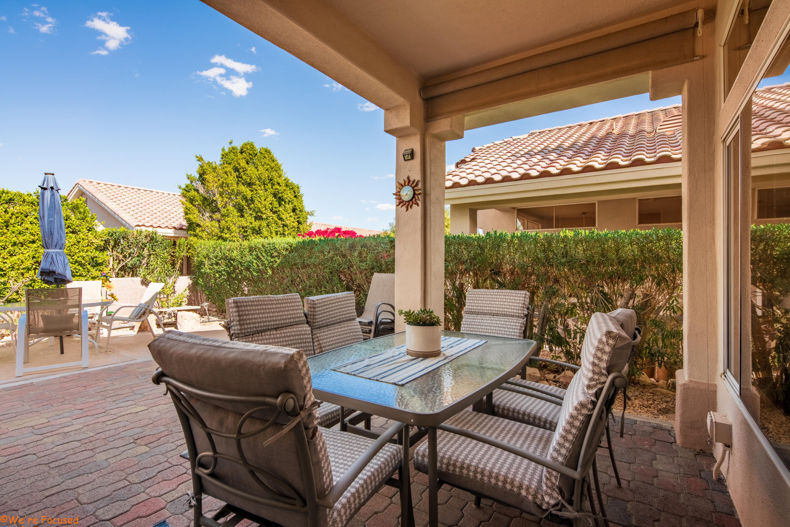 78326 Moongold Road Palm Desert, CA 92211 - Photo 26 of 33 a living room with furniture and a large window