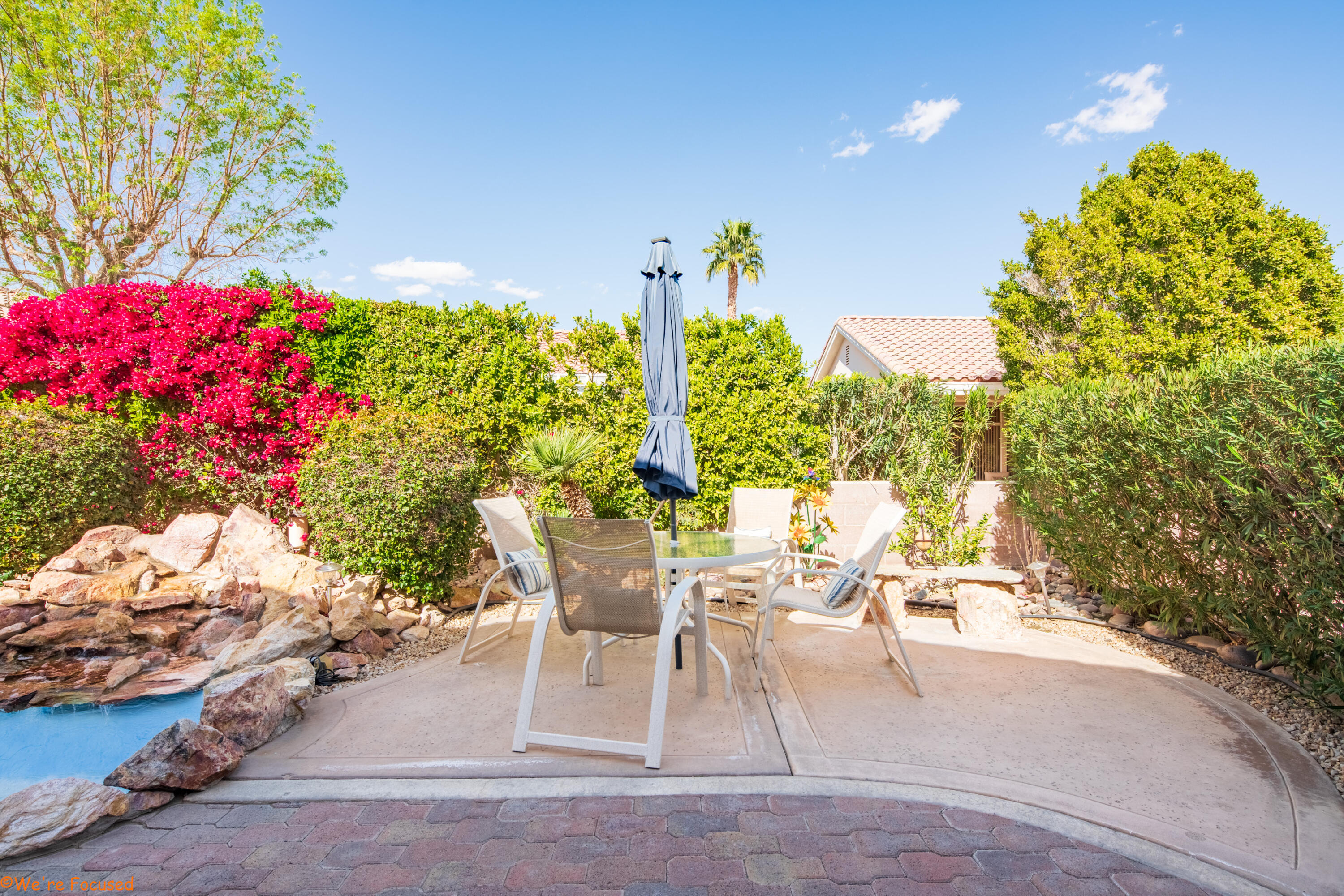 78326 Moongold Road Palm Desert, CA 92211 - Photo 30 of 33 a view of a dining tables and chairs in patio