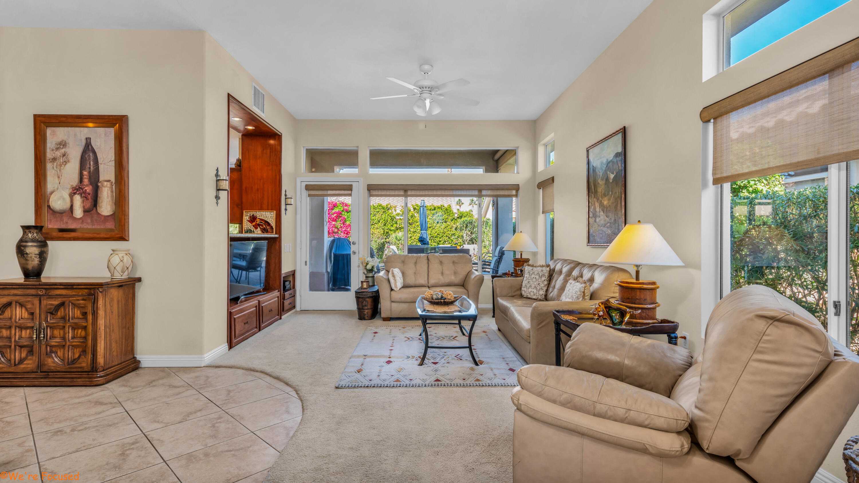 78326 Moongold Road Palm Desert, CA 92211 - Photo 3 of 33 a living room with furniture and a large window
