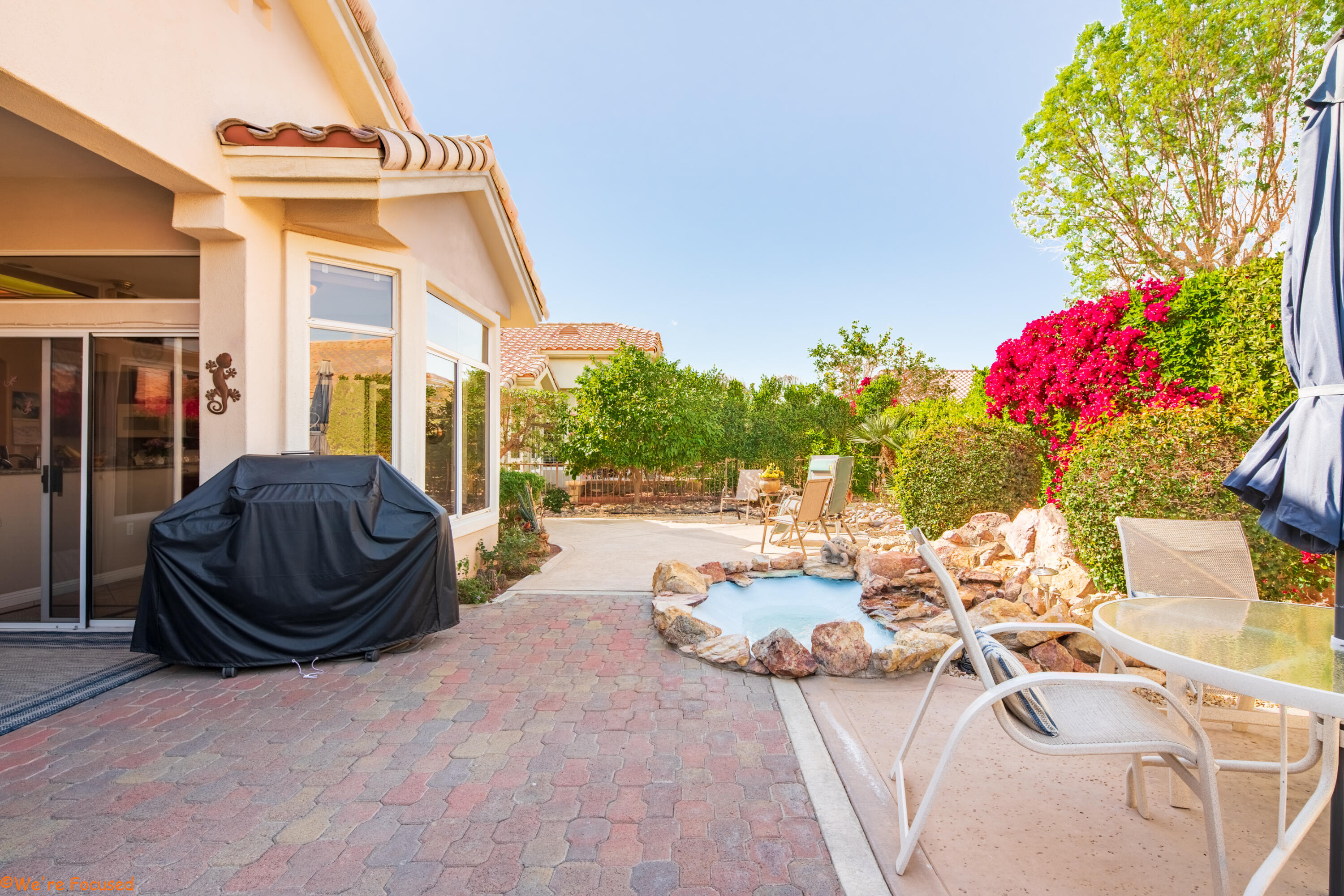 78326 Moongold Road Palm Desert, CA 92211 - Photo 32 of 33 a view of a chairs and table in the patio