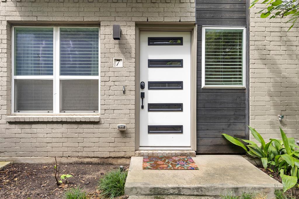 4906 Live Oak Street, Unit 7 Dallas, TX 75206 - Photo 15 of 18 a view of a door and a window