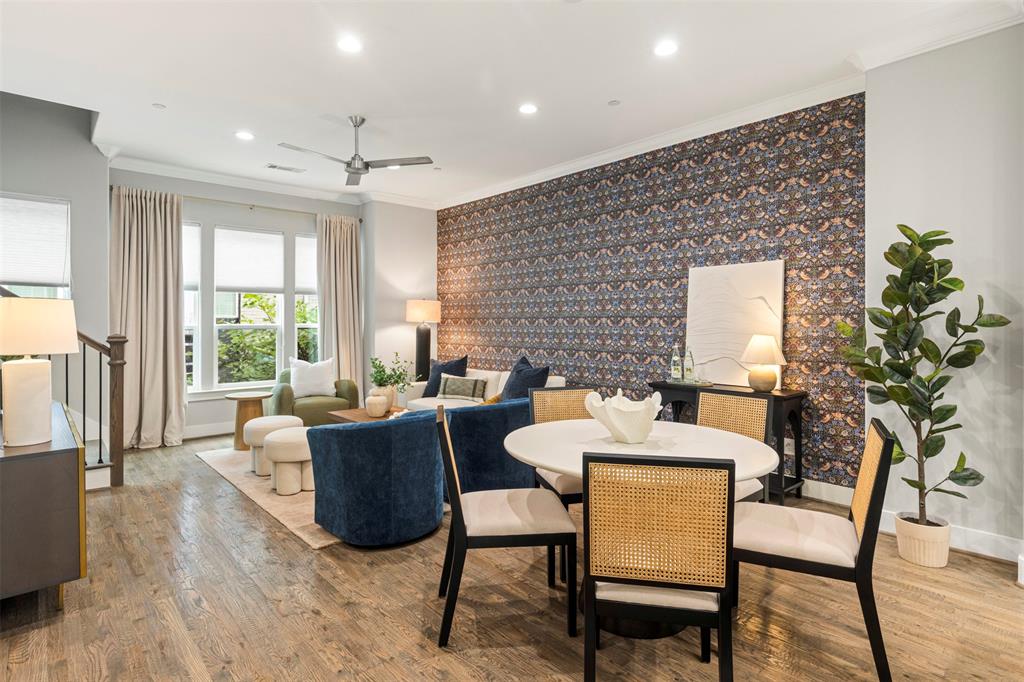 4906 Live Oak Street, Unit 7 Dallas, TX 75206 - Photo 4 of 18 a dining room with furniture a rug and wooden floor
