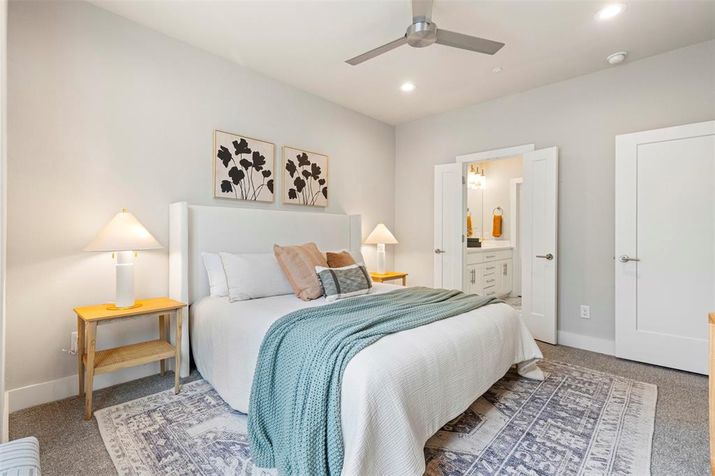 4906 Live Oak Street, Unit 7 Dallas, TX 75206 - Photo 7 of 18 a bedroom with a bed and a window