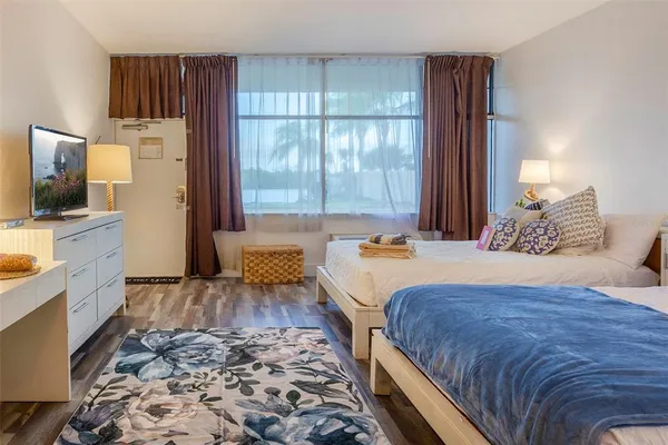 a bathroom with a sink vanity and a mirror