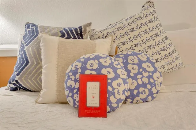 a kitchen with a refrigerator and microwave