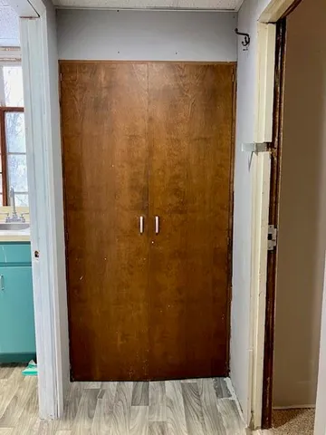 a view of a room with a large window