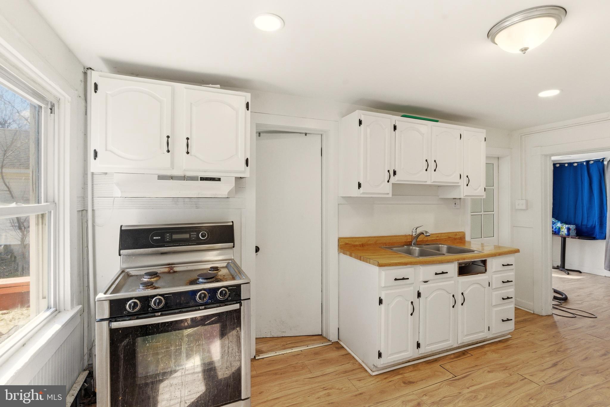 22-20 North Limerick Road Limerick, PA 19468 - Photo 28 of 49 a kitchen with stainless steel appliances white cabinets and a stove