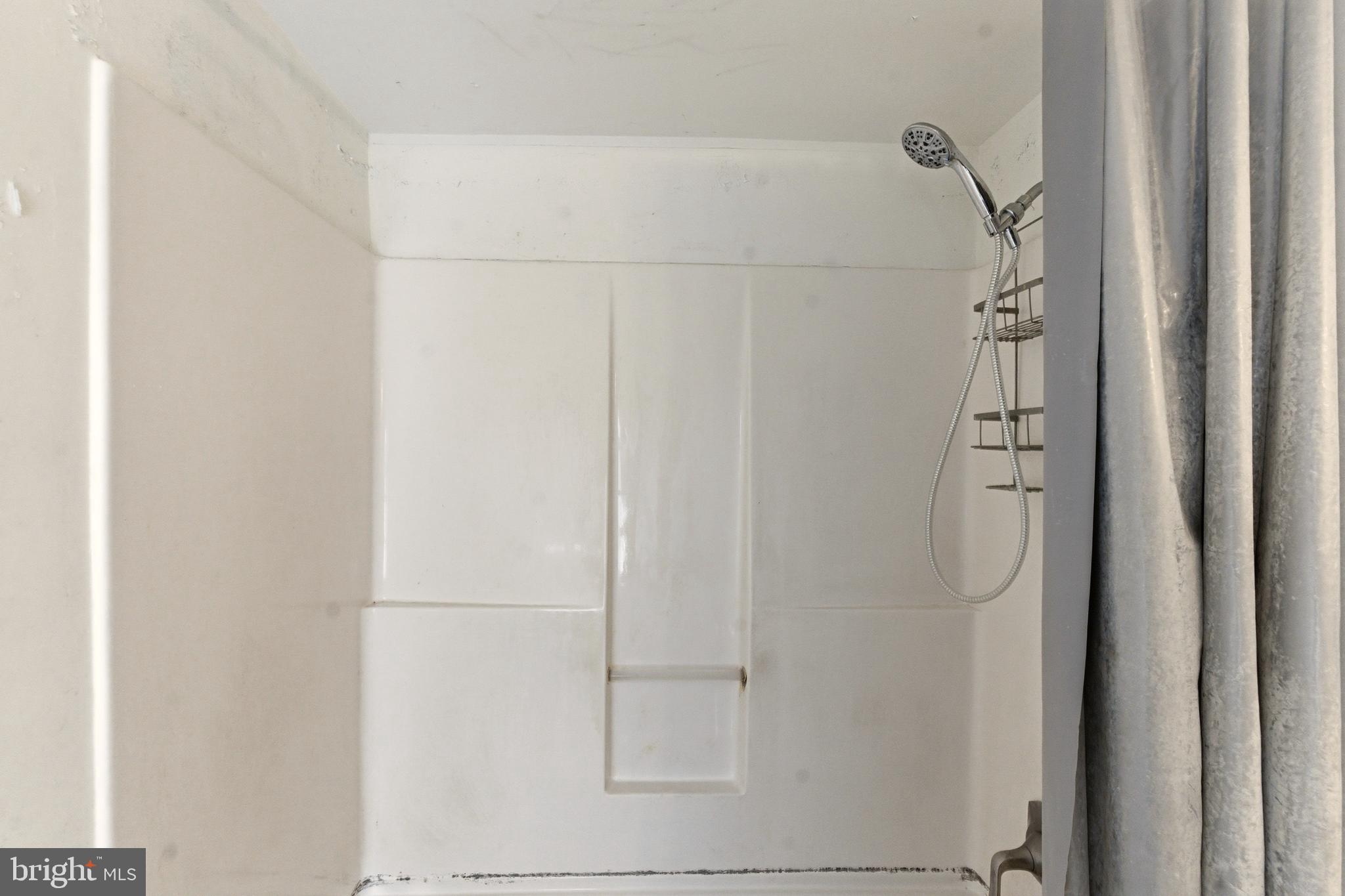 22-20 North Limerick Road Limerick, PA 19468 - Photo 33 of 49 a bathroom with a glass shower door