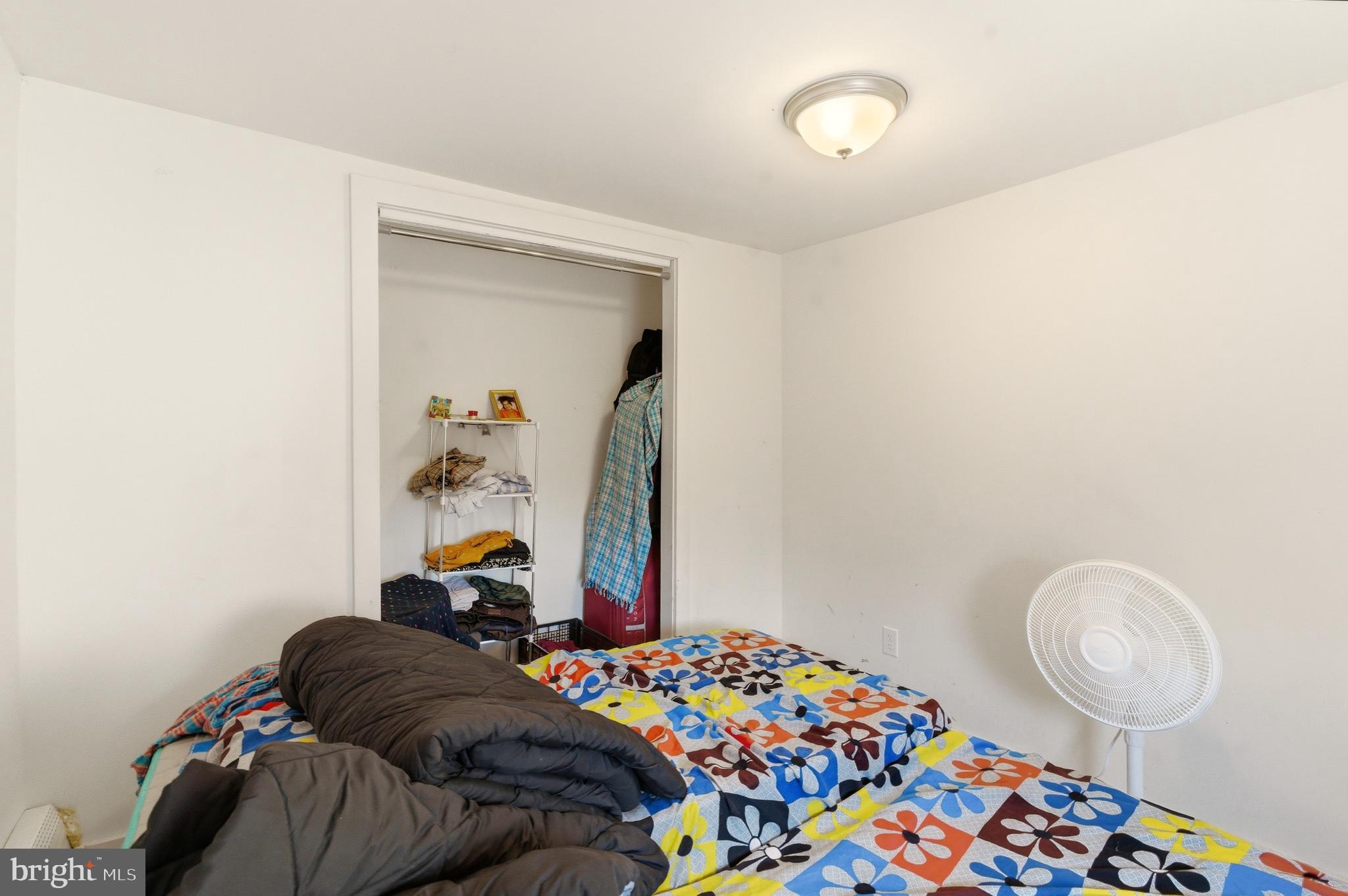 22-20 North Limerick Road Limerick, PA 19468 - Photo 36 of 49 a bedroom with a bed and a painting on the wall
