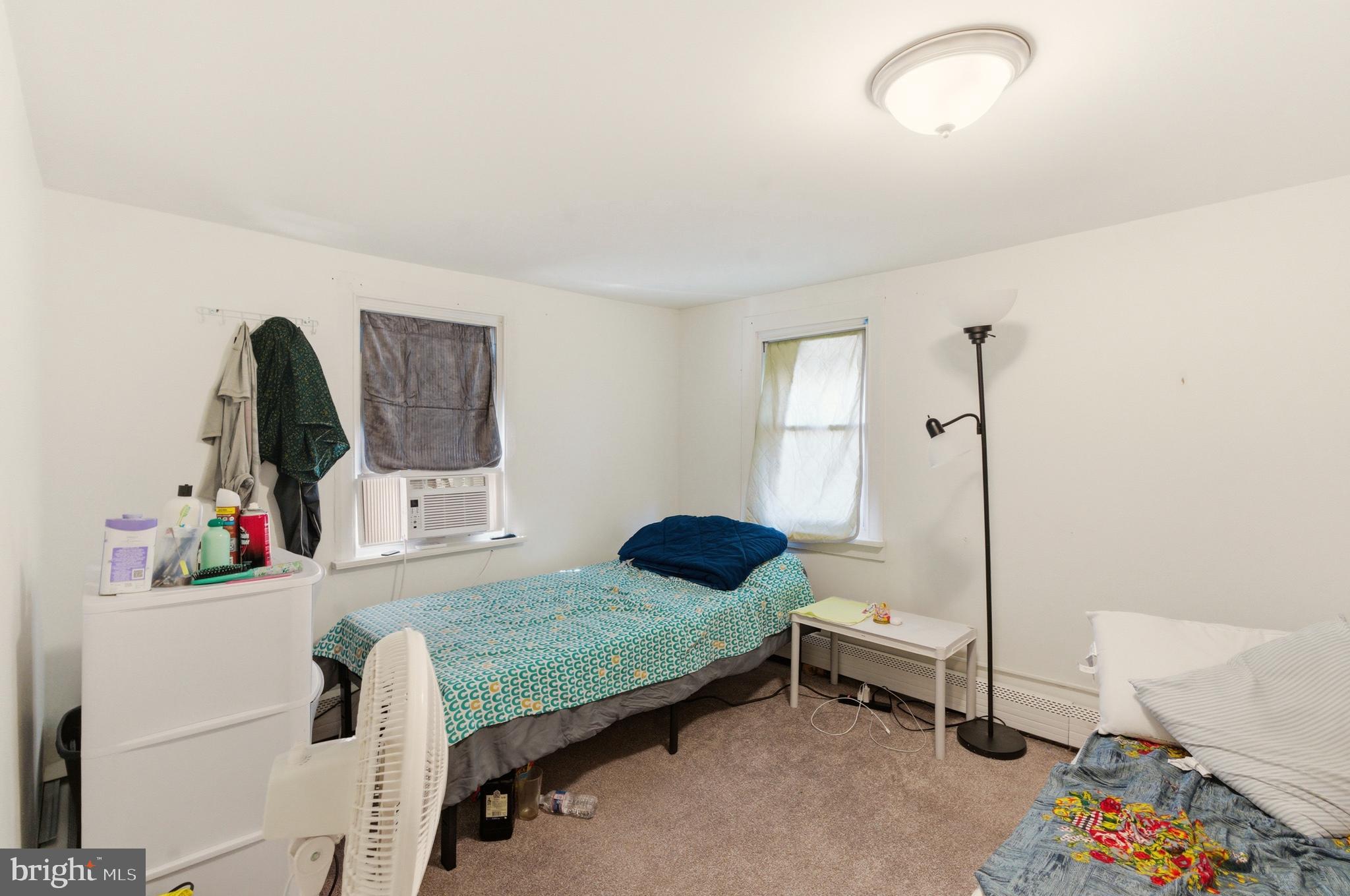 22-20 North Limerick Road Limerick, PA 19468 - Photo 38 of 49 a bedroom with a bed a couch and dresser