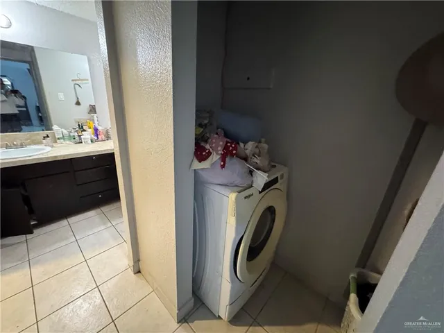 a bathroom with a sink and toilet