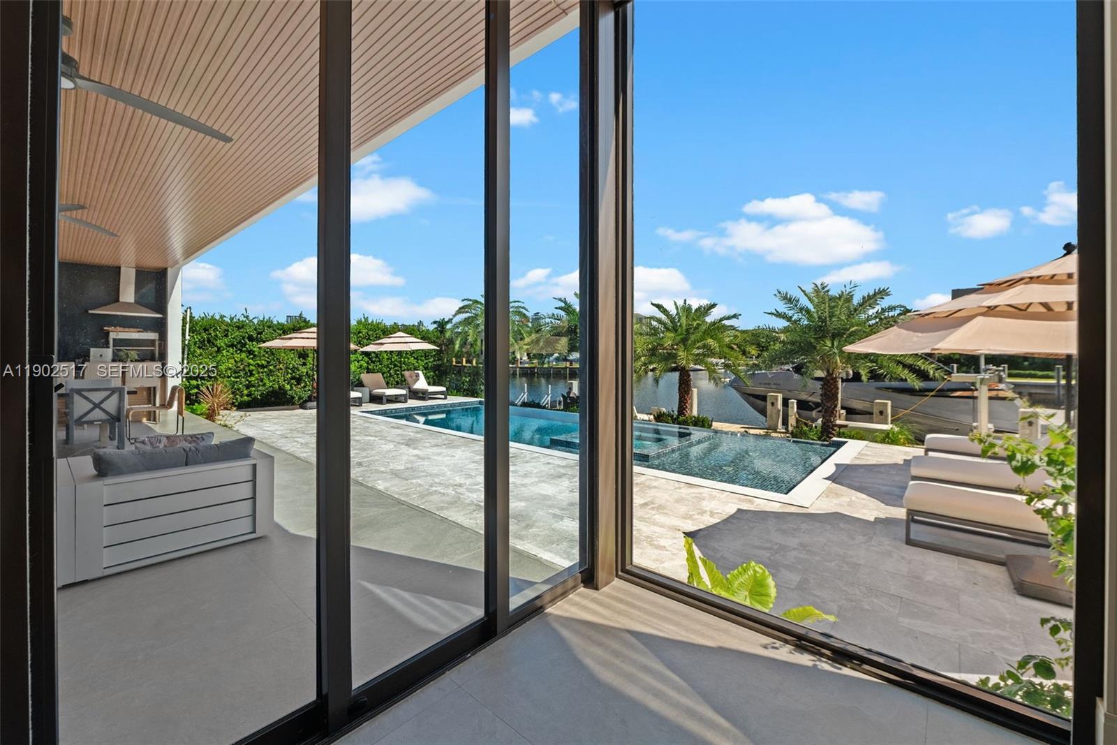 655 Layne Boulevard Hallandale Beach, FL 33009 - Photo 15 of 46 a outdoor view with a sitting space