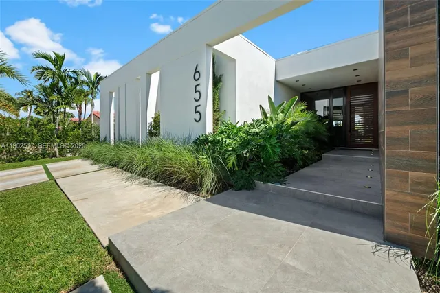 a view of a garden with potted plants