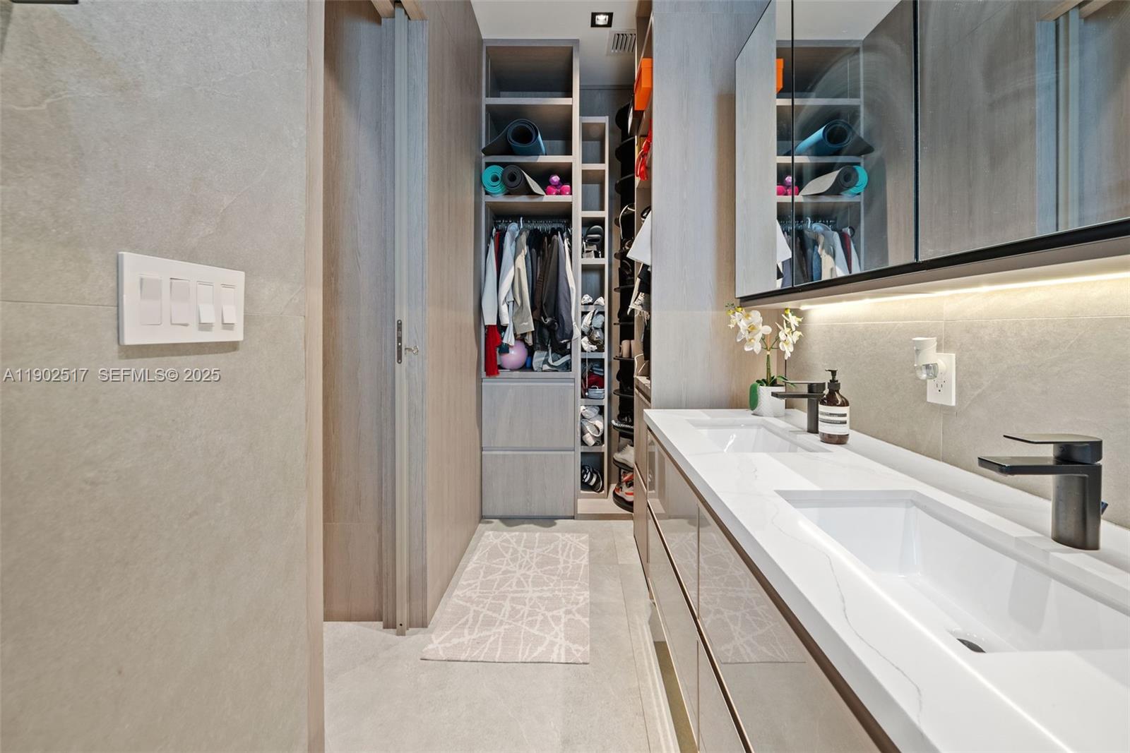 655 Layne Boulevard Hallandale Beach, FL 33009 - Photo 21 of 46 a en suite bathroom with a sink and a bathtub