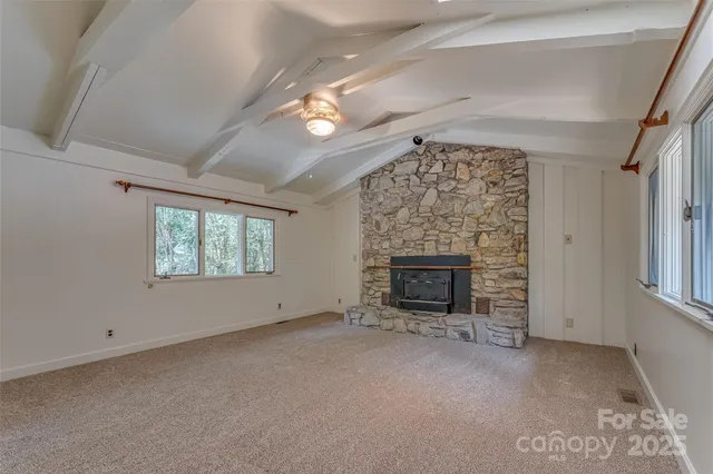 an empty room with windows