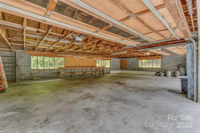 a view of a room with wooden walls