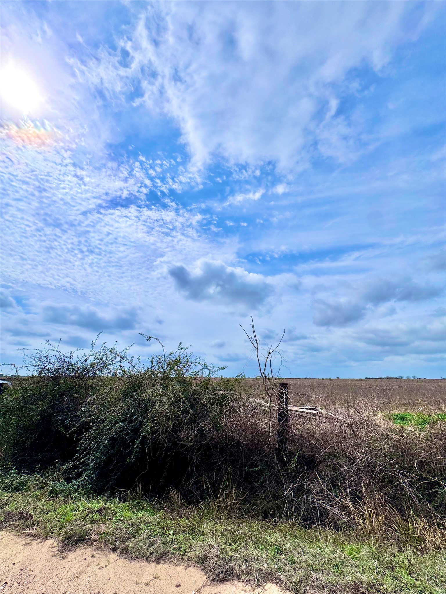 13 Beal Road Eagle Lake, TX 77434 - Photo 2 of 13 Expansive undeveloped land with a vast, open field