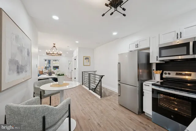 a bedroom with a bed and lamp