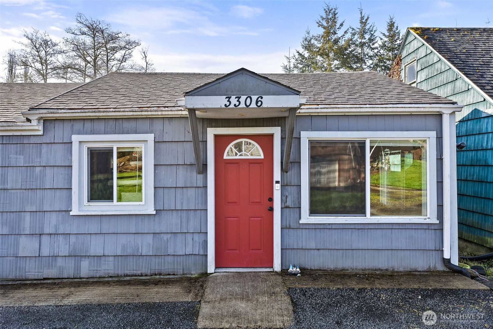 3306 Romane Road Raymond, WA 98577 - Photo 1 of 25 a front view of a house with garden