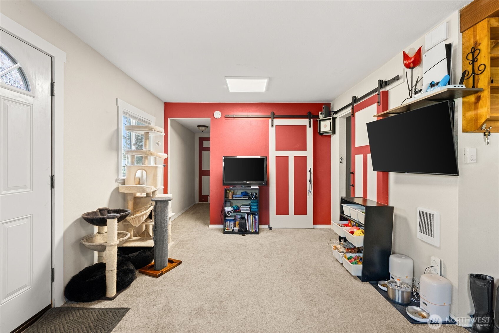 3306 Romane Road Raymond, WA 98577 - Photo 11 of 25 a living room with furniture and a flat screen tv