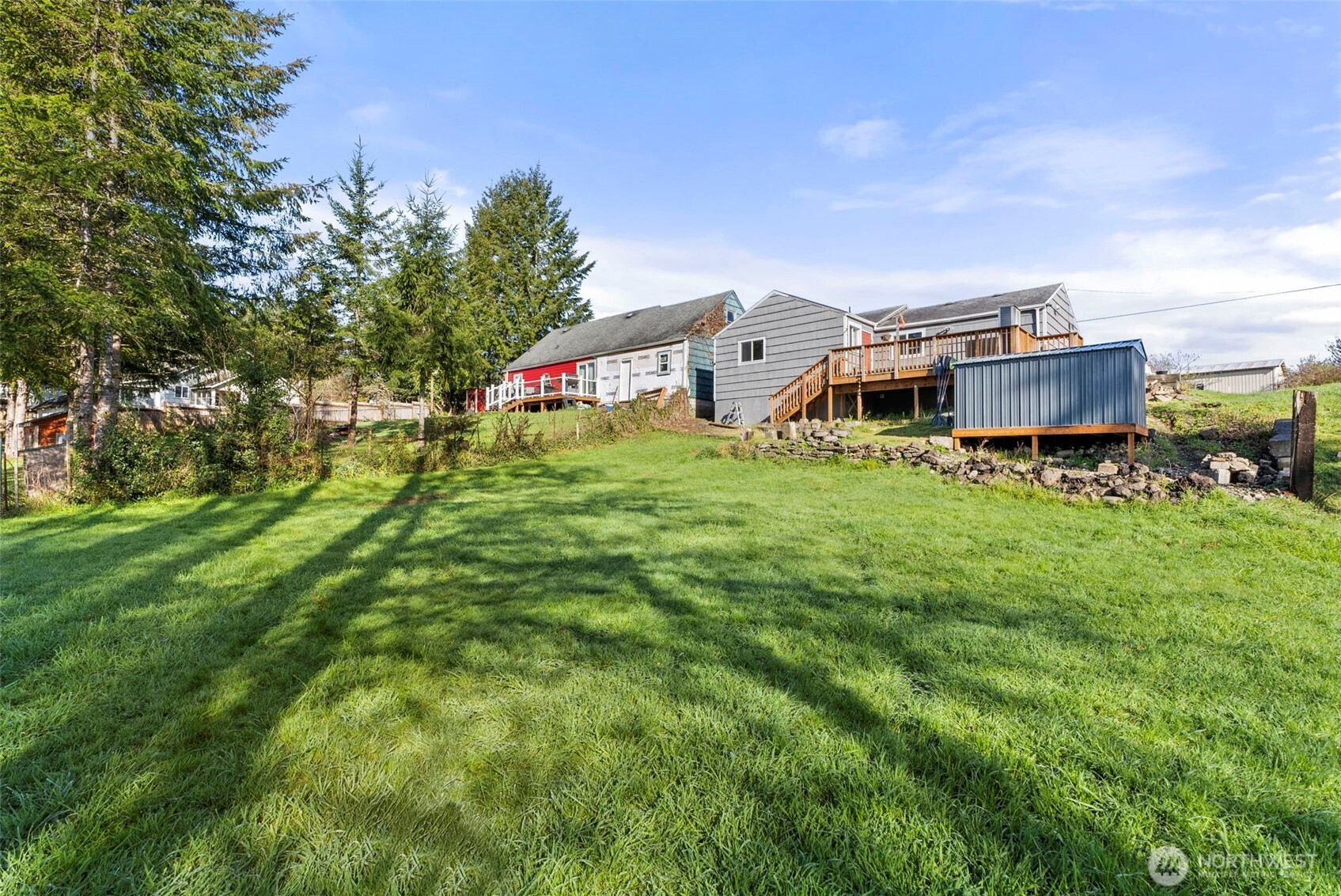 3306 Romane Road Raymond, WA 98577 - Photo 23 of 25 a backyard of a house with table and chairs